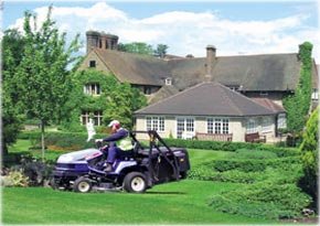 Garden Tractor Mowing Lawns